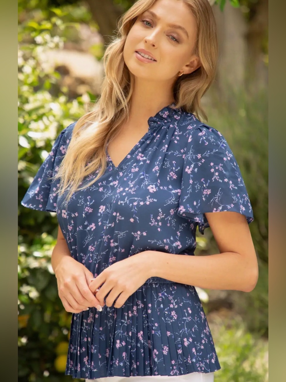 Women’s short sleeve pleated floral print top